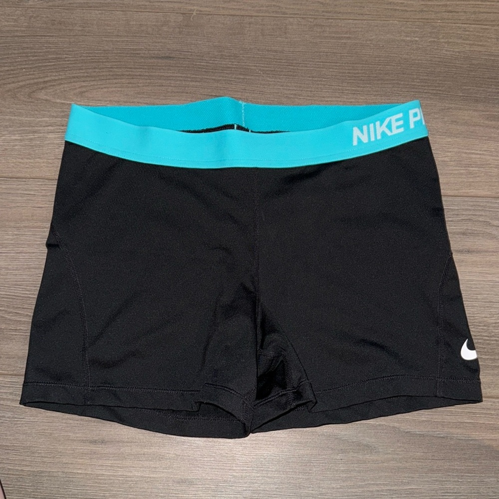 Nike Pro Dri-Fit spandex shorts size XL with teal waistband